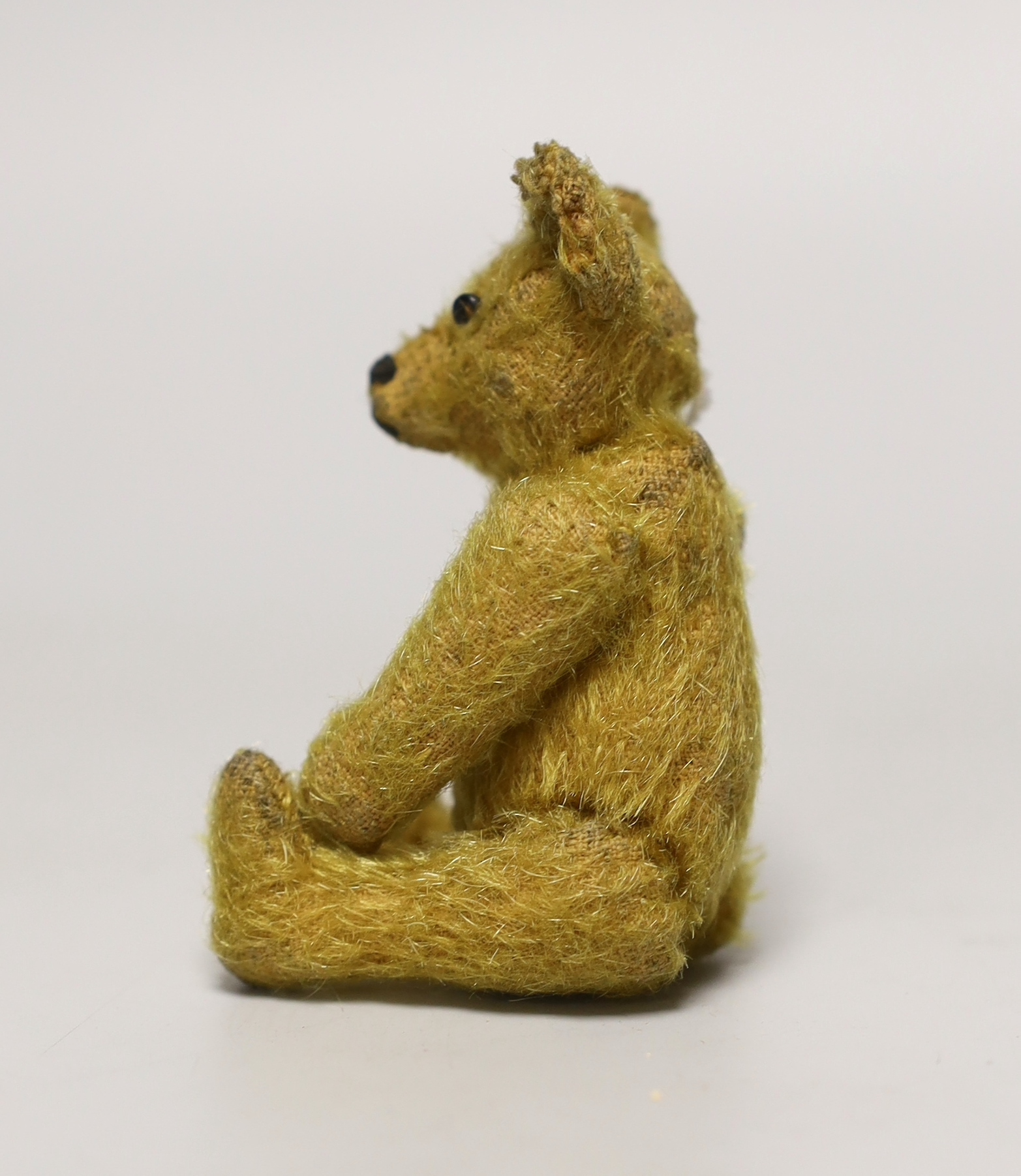 A Steiff Mini bear, c.1915, no button, 4in.